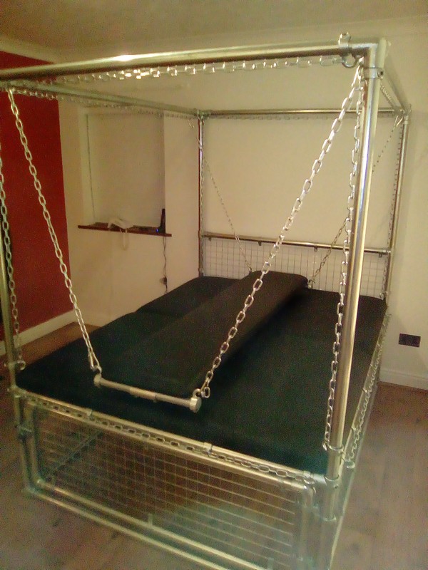 Our four poster bondage bed is very adaptable, from a king size "normal bed" to a narrower bondage bed, as long or as wide as you desire. Need a cage ? we can add one of those to :) More chains ? less chains ? Tell us your needs and we can build it.
dungeonkit.co.uk
