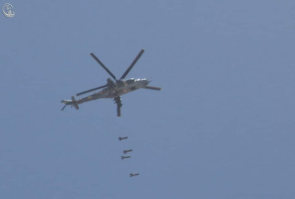 FARED_ALHOR's tweet photo. The first photo, a Syrian helicopter, throws barrels on the Syrian people.
The second photo, an Australian helicopter, throwing carrots to Australian animals. https://t.co/0putYRrrKU