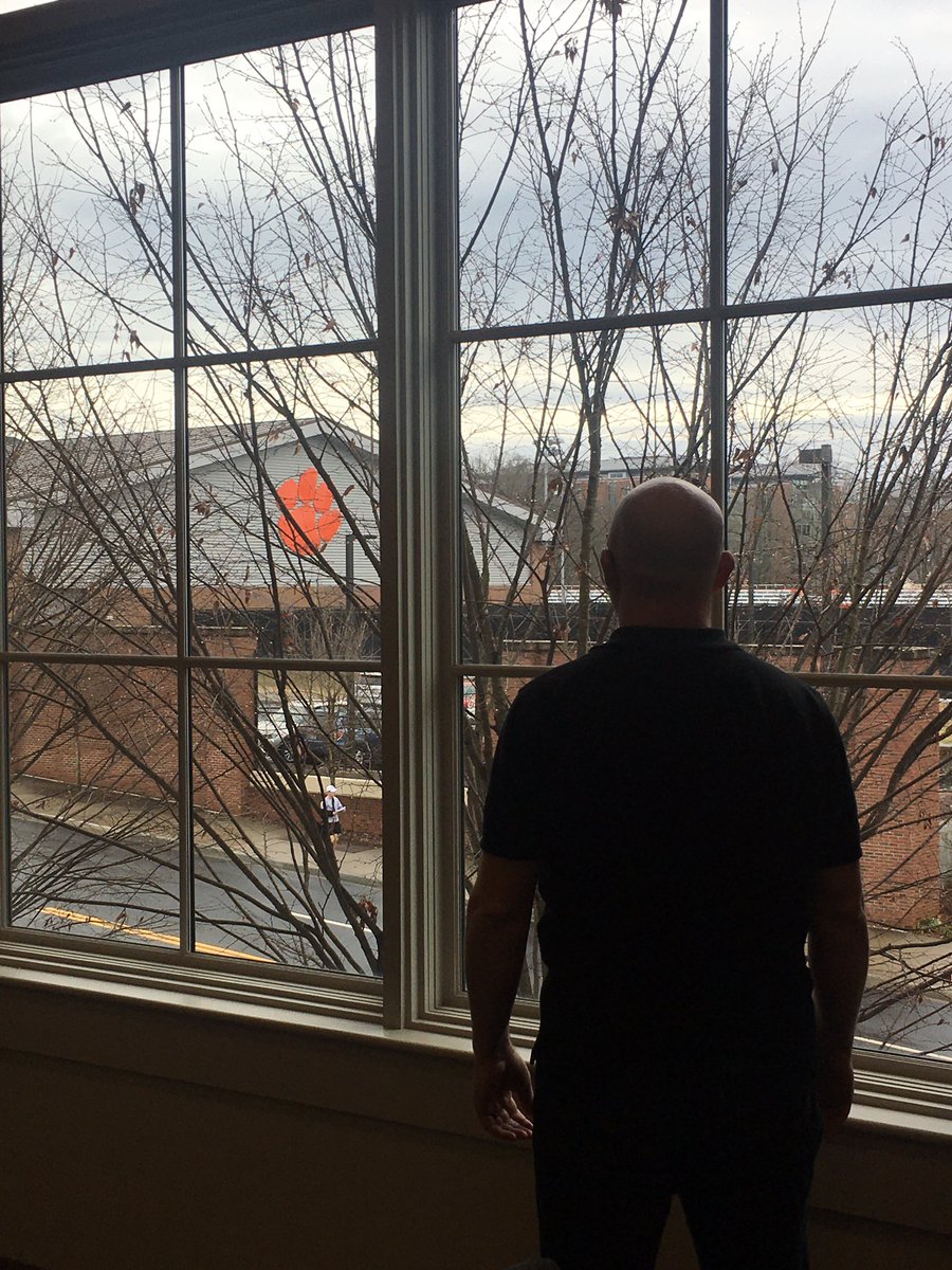 bahoward's tweet photo. @bryantlaird just can’t stop staring at the Clemson Tiger Paw while we’re here in town. He’s thinking: “I can’t think of anywhere else I’d rather be for this National Championship game tonight!” https://t.co/HK8iM69Lox