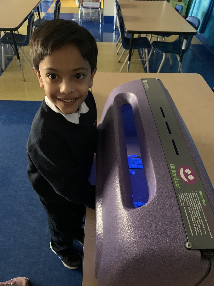 MsT_trinity's tweet image. Kindergarten students using the “Germinator” to check on their hand washing skills.  #TrinityLearns