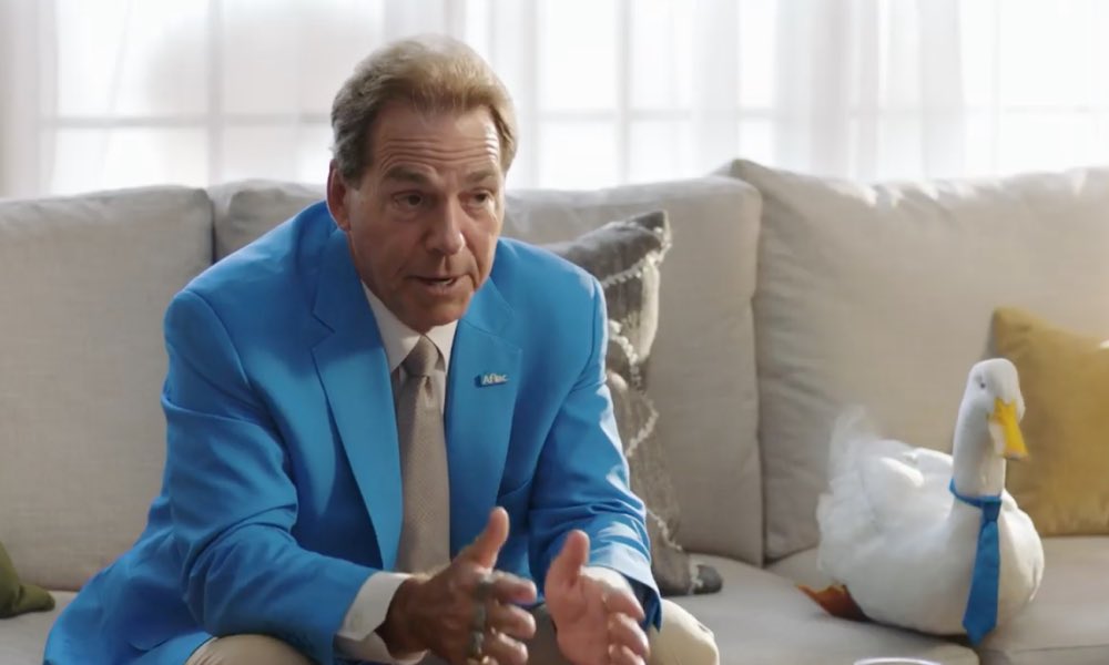Clintau24's tweet image. Nick Saban wearing his Aflac suit is such a power move 😂