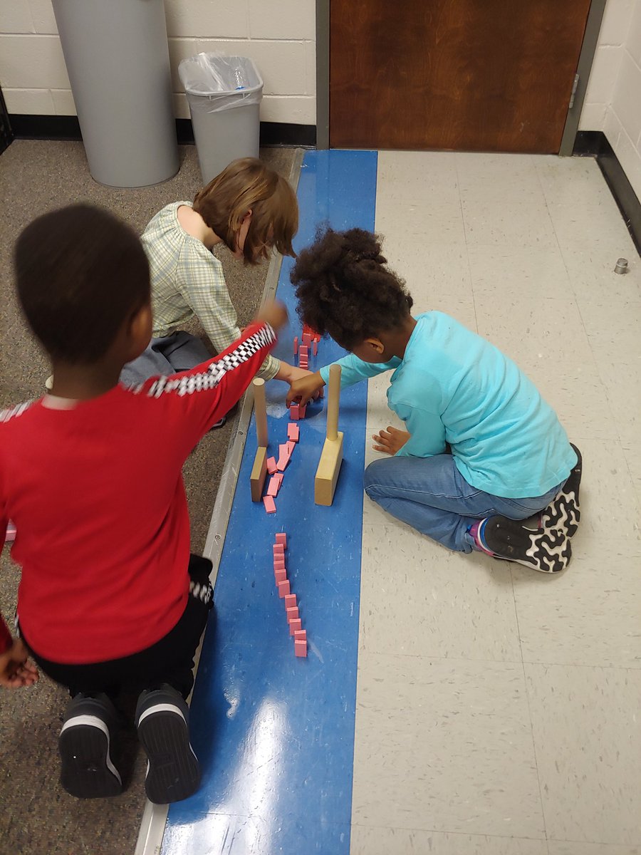 LoriWebber9's tweet photo. STEM challenge with Mrs. Perry today... Domino runs! #mccallstem #happiestschoolincobb https://t.co/CdKnpLqOrg