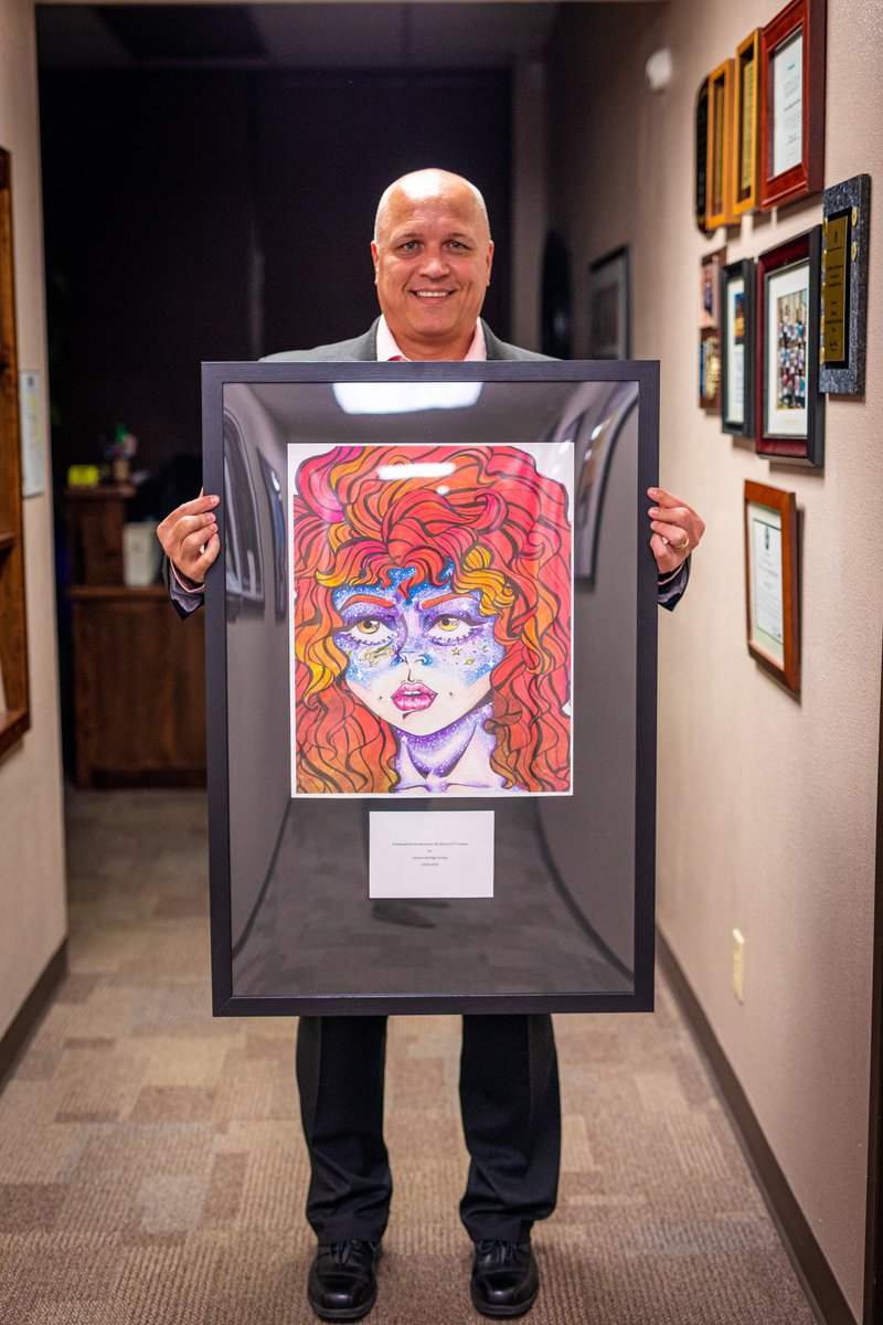 BurlesonISD's tweet photo. In honor of #SchoolBoardMonth, principals presented student artwork to trustees on behalf of their campus. Trustees also received a BISD sign made by welding students. We thank you all for your leadership &amp; commitment to BISD students &amp; staff! https://t.co/EAsmkXDBGR