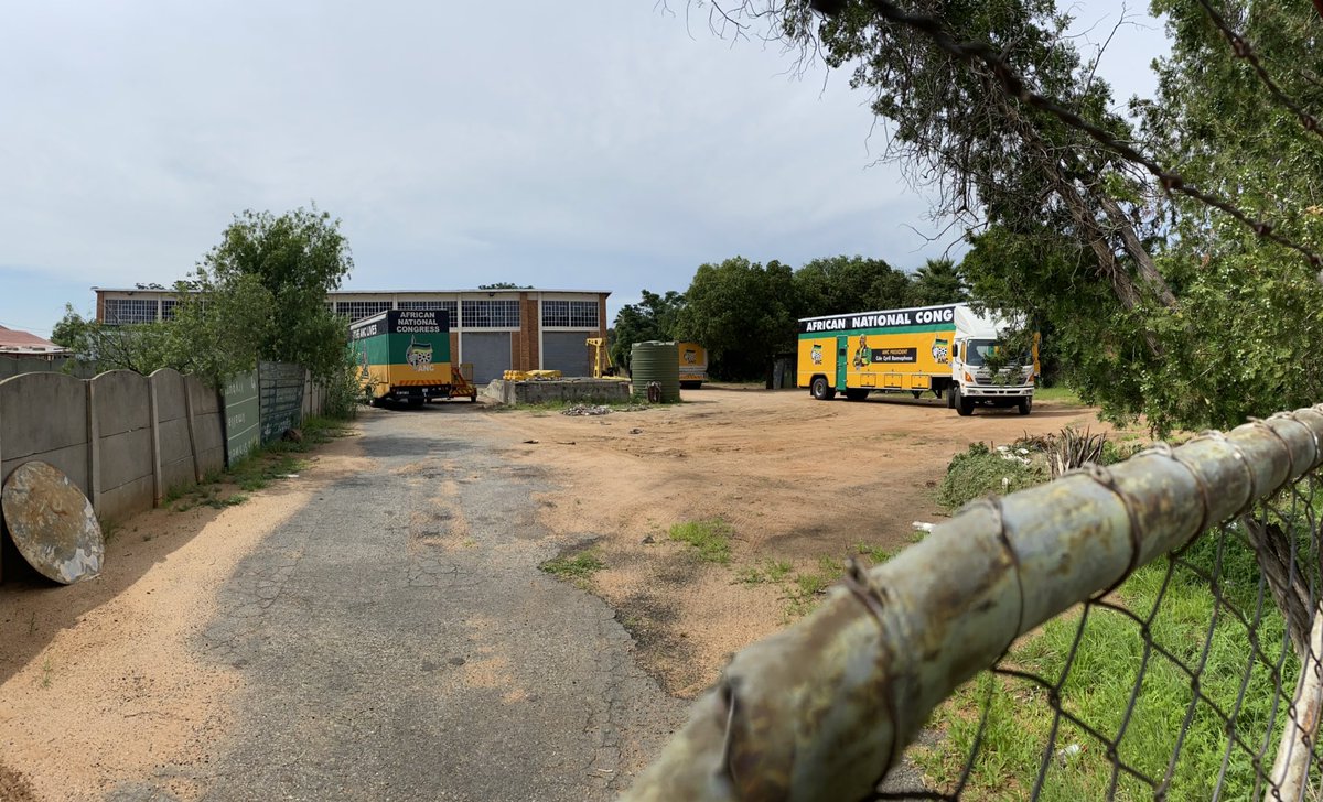 ChrisHattingh98's tweet photo. ANC blurring lines between party and state again. ANC trucks parked at the Department of Public Works @ Schweizer-Reneke. https://t.co/w7TT0I3QpR