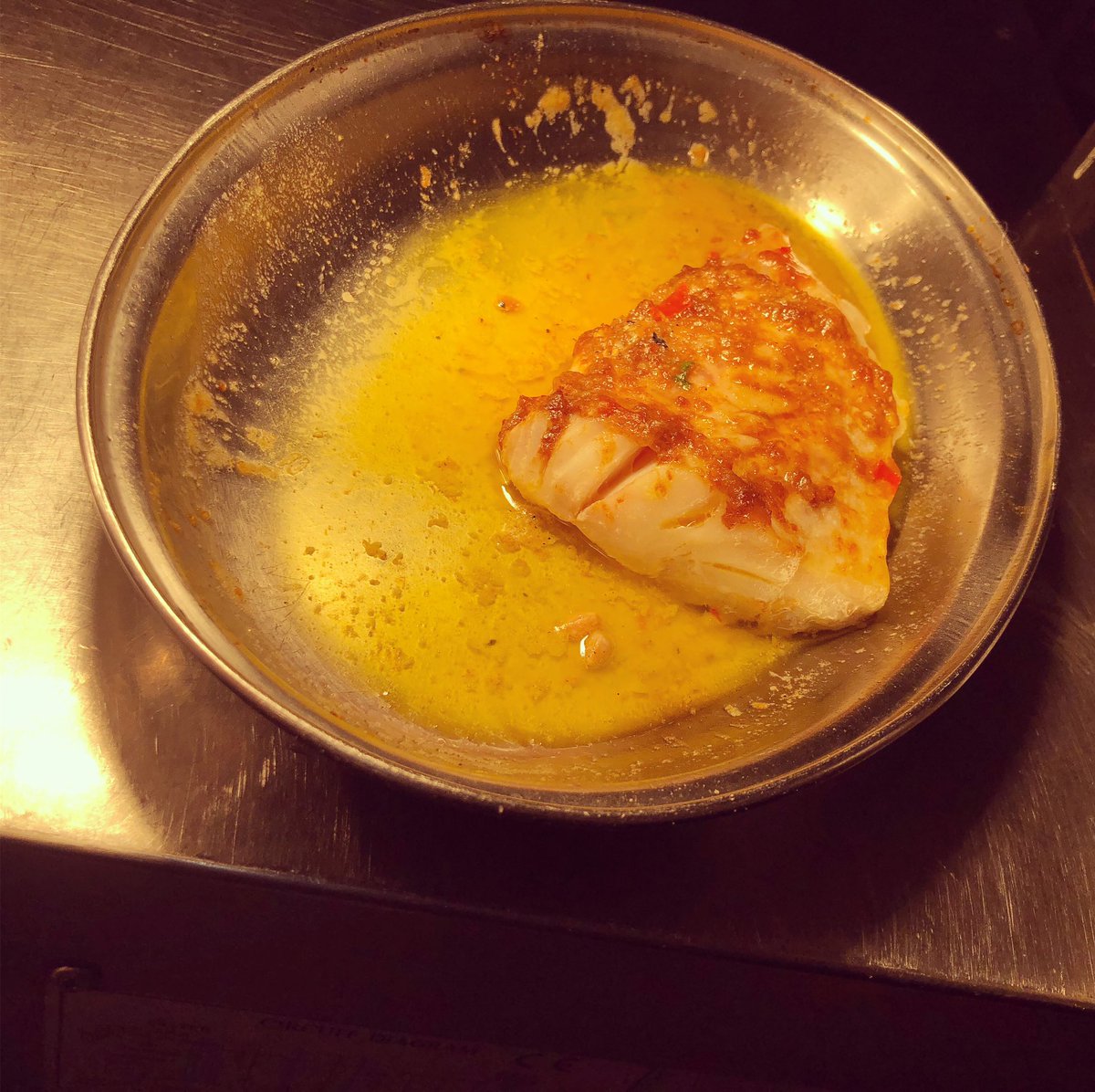 Confit pollock, then finished under the grill with XO and then rested in lemon butter, served with a lentil &amp; pollock head &amp; collar ragout. #fish #victoriapark #bristol #pub