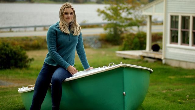 Youth sitting on a boat