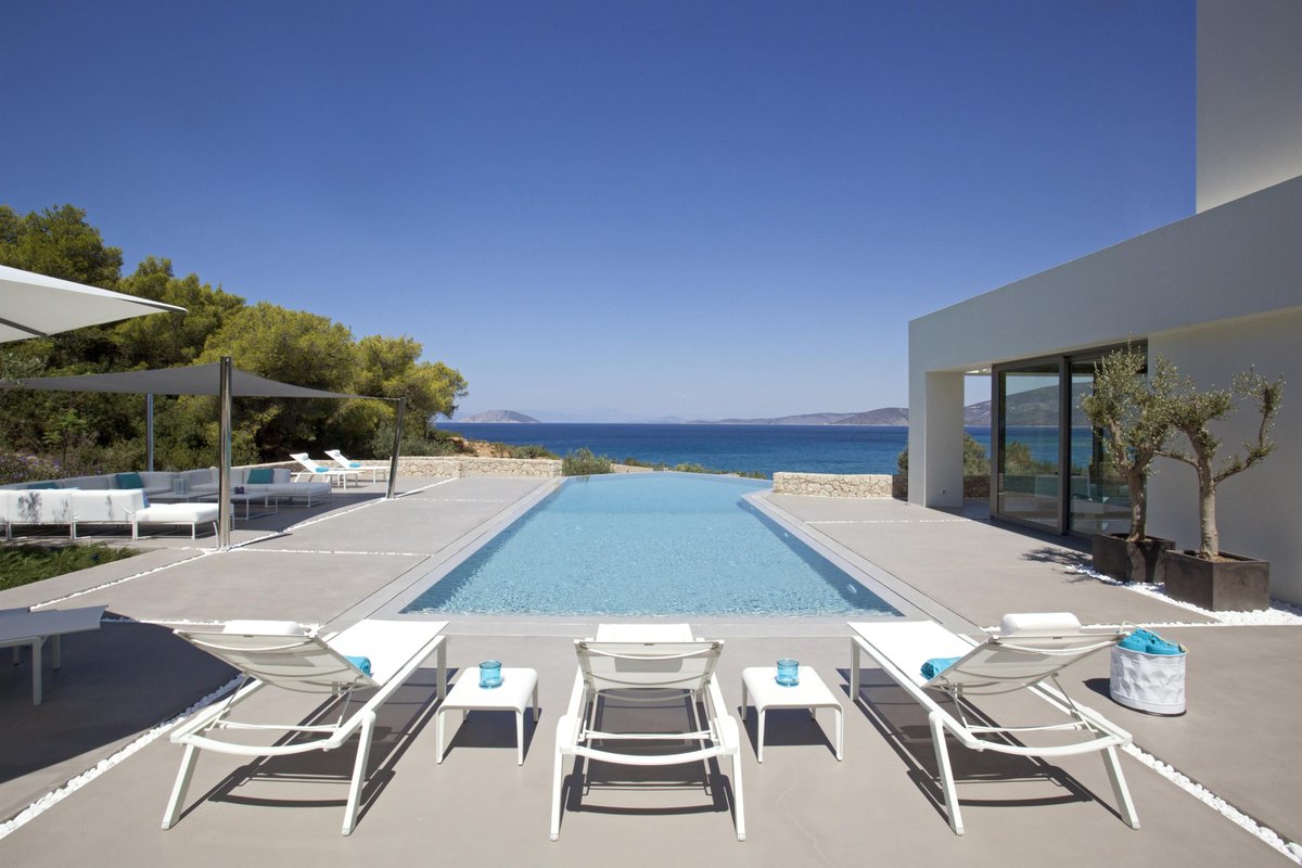 That moment… you discover the view from your villa! ⁠
⁠A striking contemporary retreat with direct access to the beach. bit.ly/2TmmZZx  #portoheli #seaviews #poolvibes