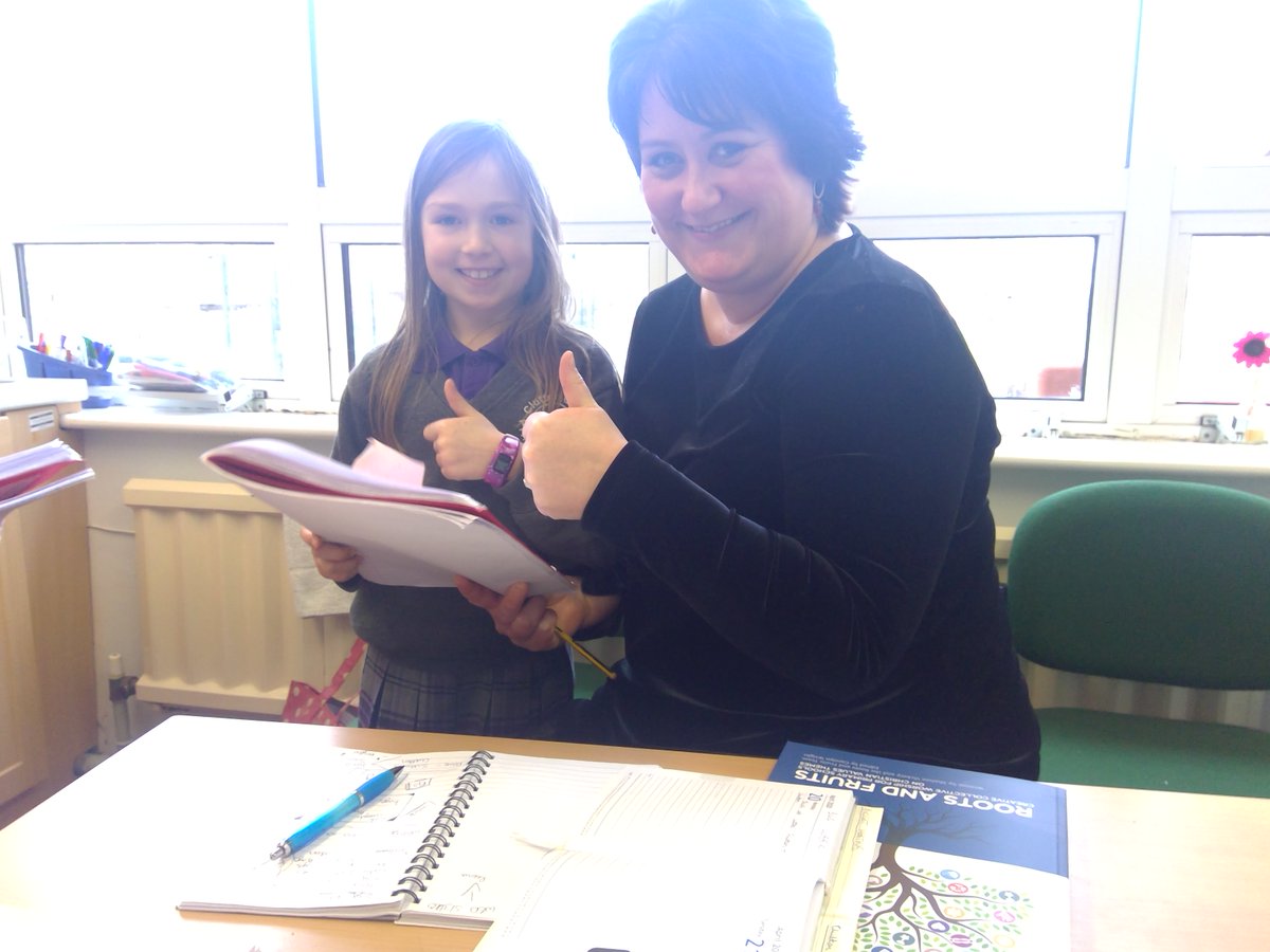 Sharing our poems with Mrs Carciero. Such clear, confident reading. Well done girls!