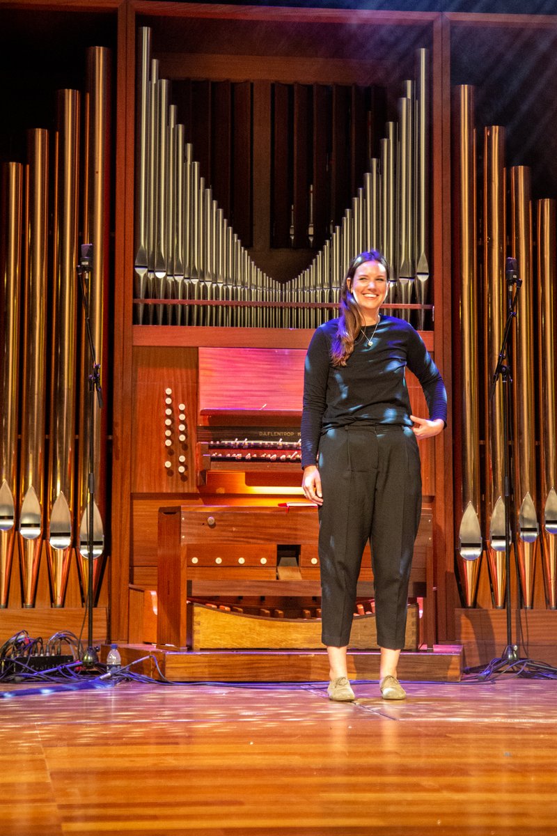 Claire M Singer on stage in Queen Elizabeth Hall at Southbank Centre