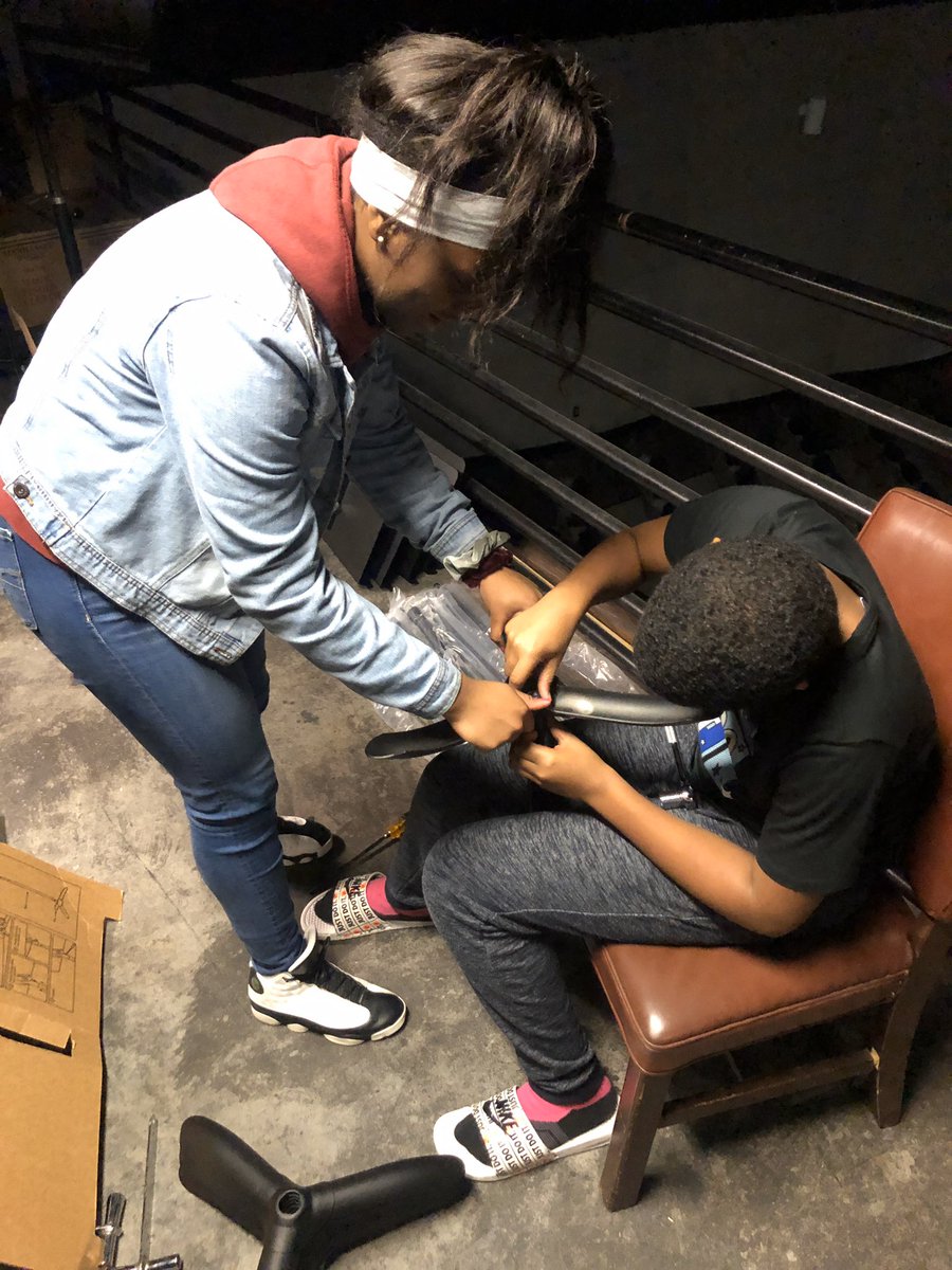 HavelockHS Band students work on assembling stands after exams.