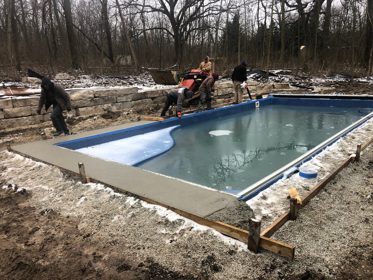 DutchBarn's tweet photo. Checking in on this New Lenox pool project... working through January has never felt so good! #januaryweatherwhat #makingprogress #workingthroughwinter #bluehawaiian #tanningledge #hardscapingdesign #dutchbarnlandscaping #dutchbarnpools #partneringtocreateyouroutdoorparadise https://t.co/GpnPwy5dME