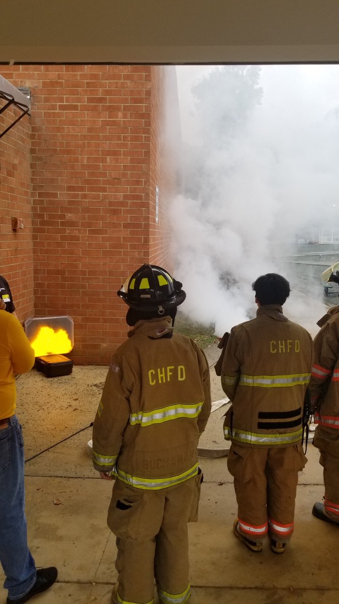 RobinGallaher1's tweet photo. Firefighting students at Chapel Hill High School used a fire simulator to put out “fires” using water hoses and lasers. @chccs @chapelhillgov https://t.co/tiOdmnCNrC