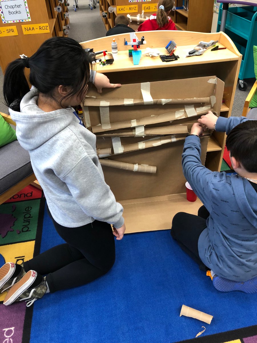 CodingKearney's tweet photo. @HowellTwpAldrch 5th graders using gravity to create a marble drop. Extra challenge-- The marble must stay in motion for 10 seconds! #IDEAlab https://t.co/lmM2UbtEbC