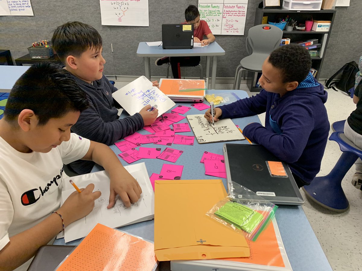 TerrasetES's tweet image. The brainpower at the table is impressive. Way to go, 5th graders! #talkingaboutmath #TigerPride @SWhitemath
