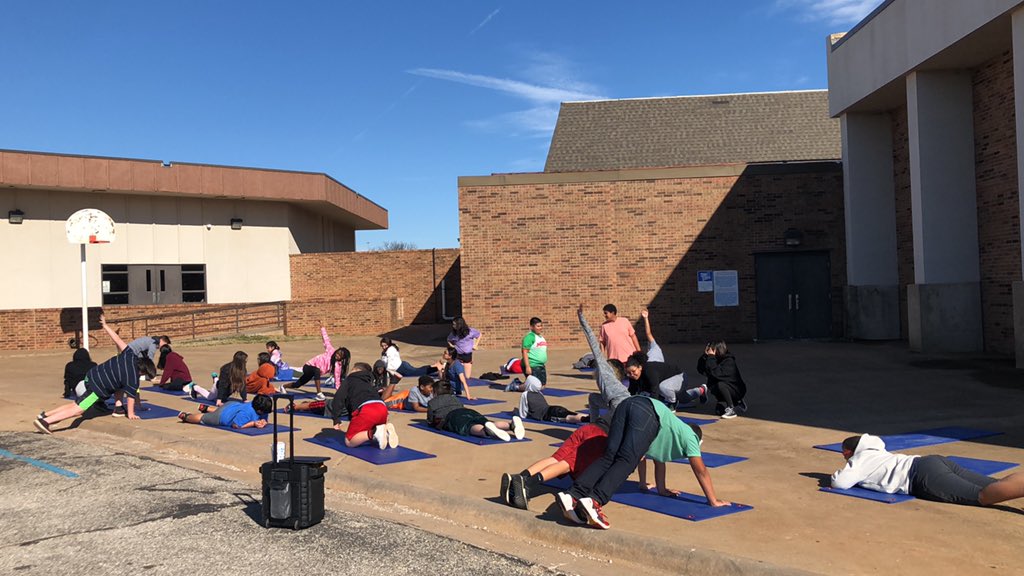 AbbyTwining's tweet photo. A little outside yoga with my student teacher and kiddos this nice afternoon. #bebold #iamwfisd @Smacunningham @KirbyWFISD https://t.co/g73WhJ1VfS