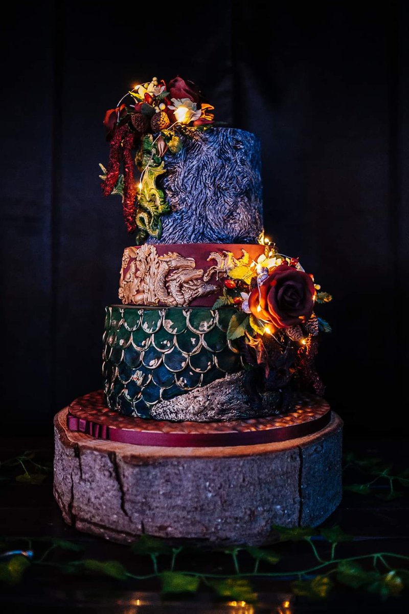 cpatchbakery's tweet photo. 🐉GAME OF THRONES WEDDING🐺
Made using @Massa_Ticino and Spectrum Flow colours from @CakeDecorateCo - we're totally smitten 😍
Nods to every house, dragons - what more could a super fan want? 💜 #yesitscake #gameofthrones #wedding https://t.co/2qin0WFYys