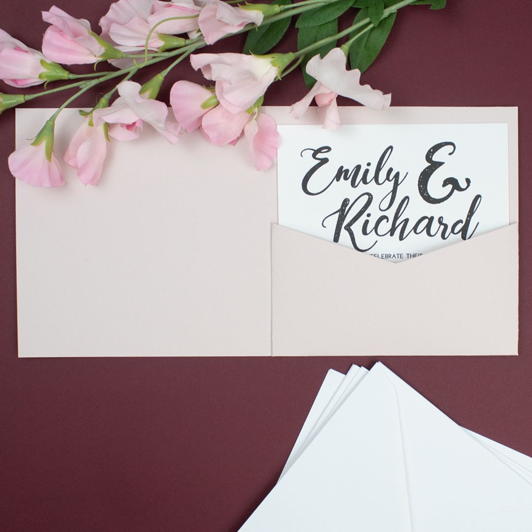 Not only are pocketfolds a beautiful way to display your wedding invitations, they're great for neatly holding all those little extras (RSVPs, travel and accommodation info, etc.) too! 
📷: Blush Pink Matte Pocketfold with White Envelopes
🔗:buff.ly/2FOVIa7