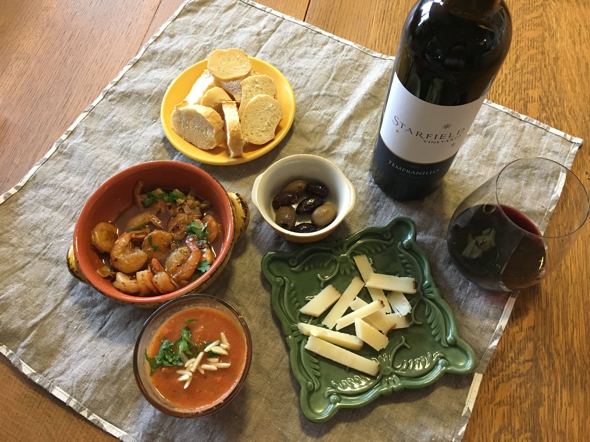 Tasty Tuesday: Try a smooth #Tempranillo with #tapas. We fixed #shrimp in garlic + #wine, #manchego #cheese, #olives, + gazpacho soup and bread. #tastytuesday #easymeals #dinnertime #wineandcheese #winelover #foodpairing #winepairing
