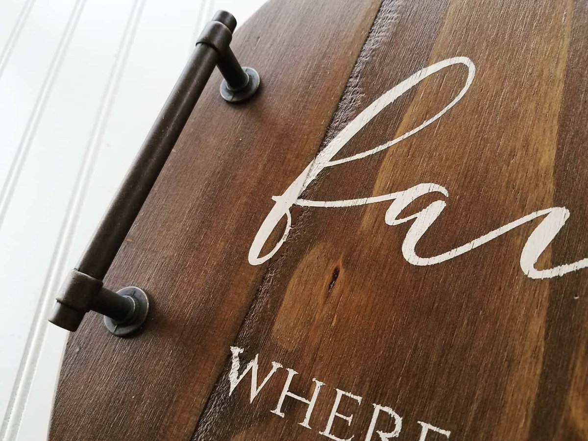 Tray #7 of 8 - mix of light and dark brown stained round with bronze handles, white painted lettering and distressed

#roundtray #family #wherelifebgins #andloveneverends

#studio26designco #custom #personalized #homedecor #fatetx #itsfate