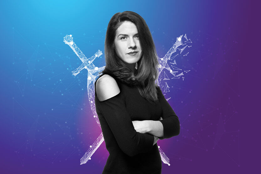 Parisa Tabriz in front of a graphic depicting data and swords