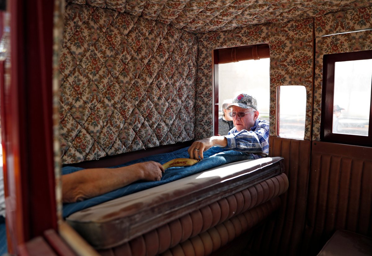 Workers load the Wells Fargo stagecoach onto a trailer as it was donated to the National Ranching Heritage Center.