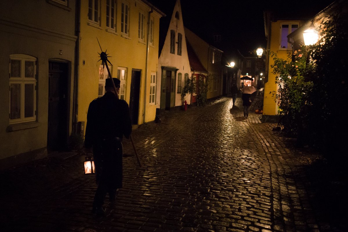 The oldest town in Denmark, Ribe, has a brilliant way to put more people on the streets after dark: night watchmen doubling as popular tourist tour guides. More cities should follow this example. Great uniform and pole arm as well. #JaneJacobs would surely approve. #GoodUrbanism