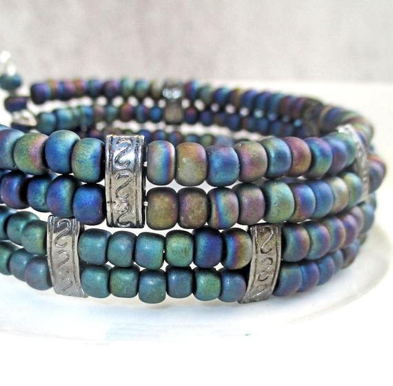 scotticohn's tweet photo. Multistrand Multicolor Bracelet, Aurora Borealis #jewelry #bracelet @EtsyMktgTool https://t.co/8jKkRu8eLp #cuffbracelet #multistrandbracelet https://t.co/5p6DpD25Sn