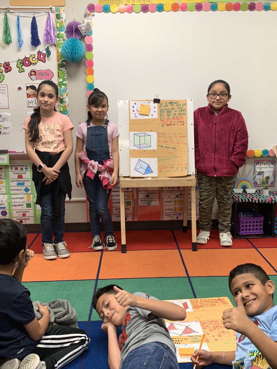 Laura19988036's tweet photo. Students presenting their 3 D shape posters . They were also asked to compare the shapes and take one out based on its attributes . A lot of geometric language was in use today .  @PasadenaELL @PISDMathematics #PISDMathChat https://t.co/q5WMjEFegO