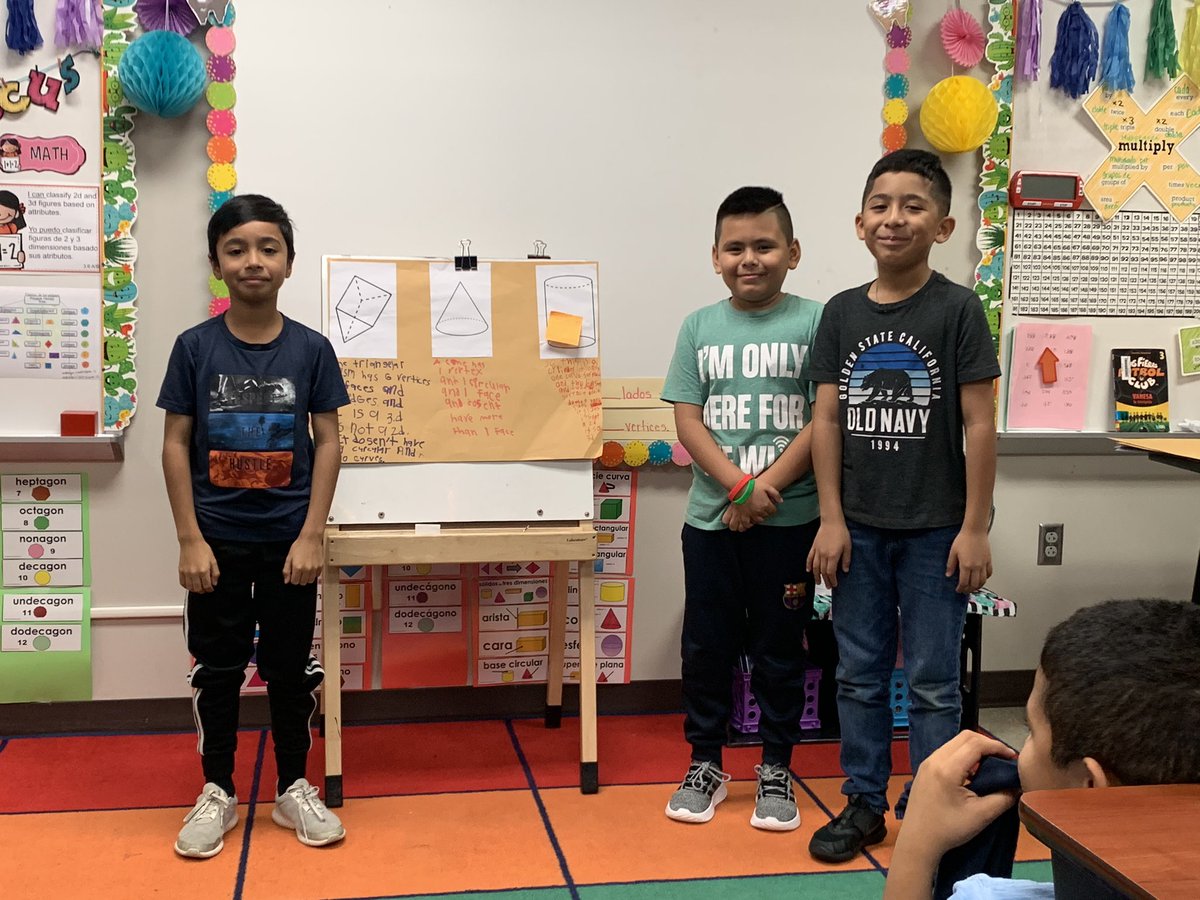 Laura19988036's tweet photo. Students presenting their 3 D shape posters . They were also asked to compare the shapes and take one out based on its attributes . A lot of geometric language was in use today .  @PasadenaELL @PISDMathematics #PISDMathChat https://t.co/q5WMjEFegO