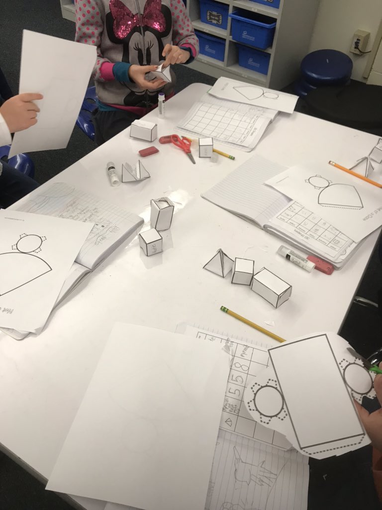 carrienichols07's tweet image. Using nets to build solid shapes and record their attributes. Students will use their learning of solid shapes to build model “green” communities that showcase environmental sustainability for their intermediate deliverable. #hqpbl #environmentalprinciples