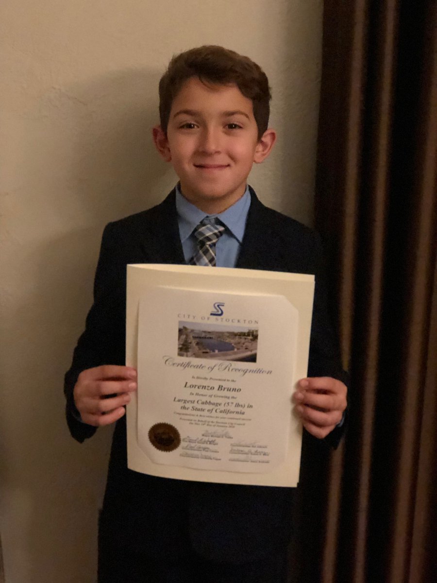 MichaelDTubbs's tweet photo. Lorenzo Bruno, the 10-year-old who was recently featured on local news for growing a 57lb cabbage, was honored tonight at our city council meeting #CabbageKing #ImWithStockton #reinventStockton https://t.co/CNV8WXi7gY