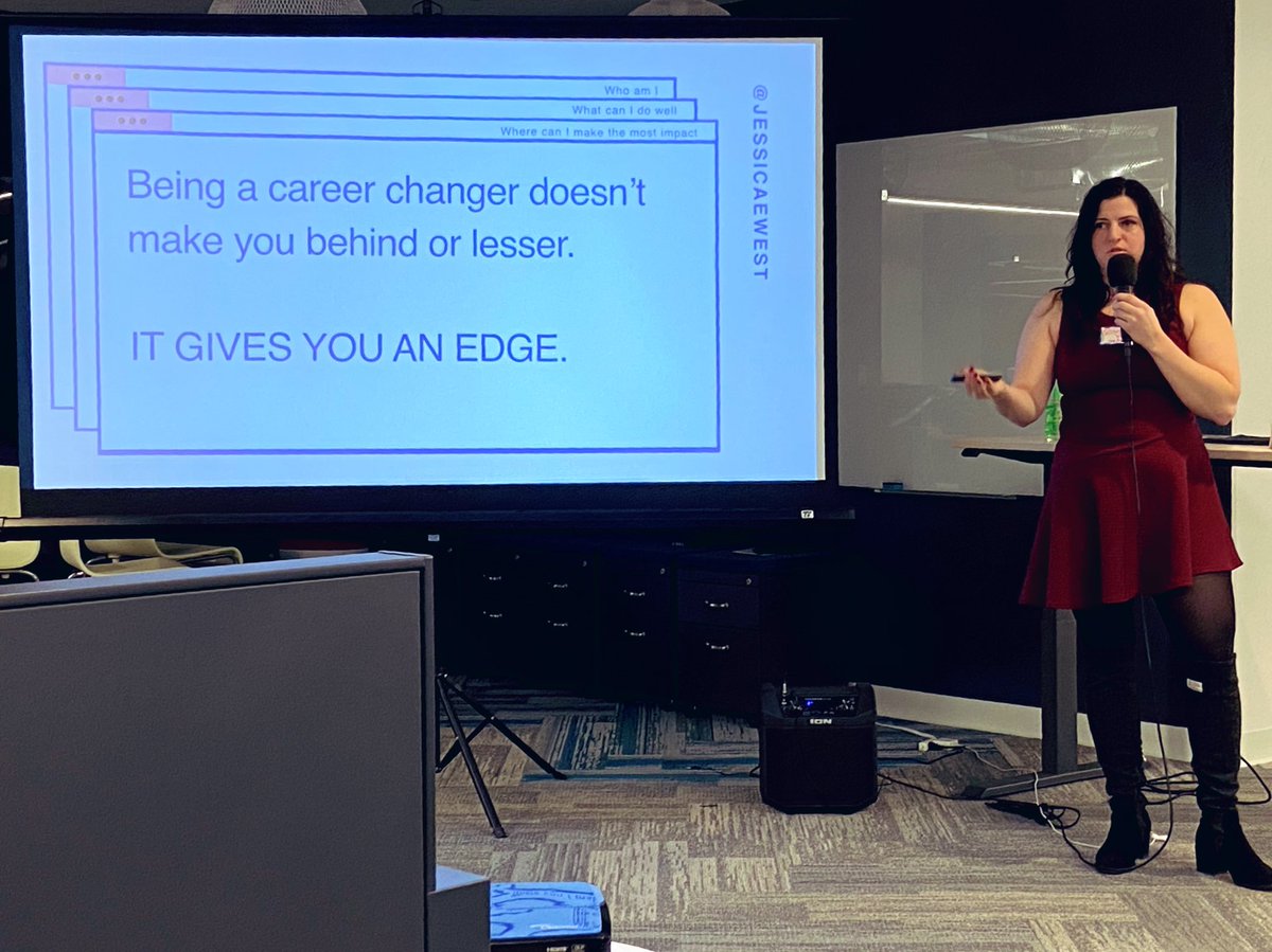 Jessica speaking in front of a slide that reads, “Being a career changer doesn’t make you behind or less. It gives you an edge”
