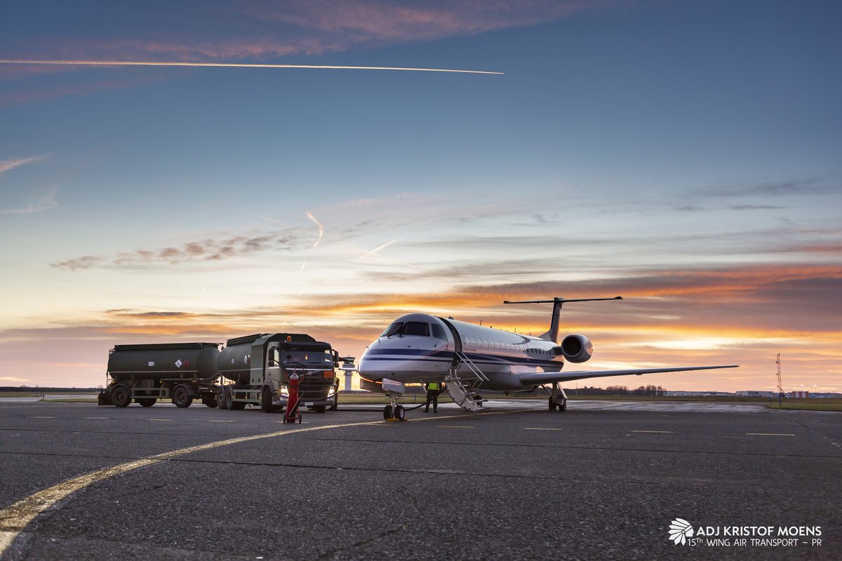 15WAirTransport's tweet photo. A windy but stunning sunrise this morning. While our @embraer #ERJ145 is being fueled and checked on the flightline, the passengers are being checked-in by the #BruMil security. The start of yet another beautiful day at EBMB. 😎🤘🏻✈🇧🇪 #WeAre15thWing #21StSqnLHL @BeAirForce https://t.co/3psHVs4D5I