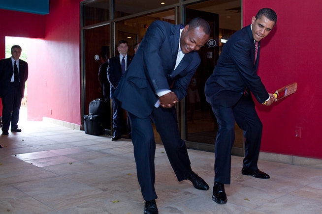 Brian Lara shows President <a href="/BarackObama/">Barack Obama</a> how to bat,  Port of Spain, April 19, 2009. "I always wanted to meet the Michael Jordan of cricket," is how president Obama greeted Lara