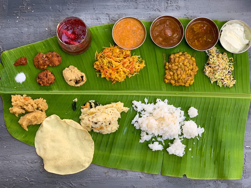 Pongal lunch 1. Onion Vetha Kazhumbu 2. Avarekalu Kazhumbu 3. Sambhar4. Cabbage-Carrot Poriyal5. Kosambari 6. Pepper Rasam7. Green tomato chutney 8. Masala vada9. Ven Pongal10. Shakara Pongal11. Curd12. Papad13. And Kaanji to represent my Punjabi side ;)