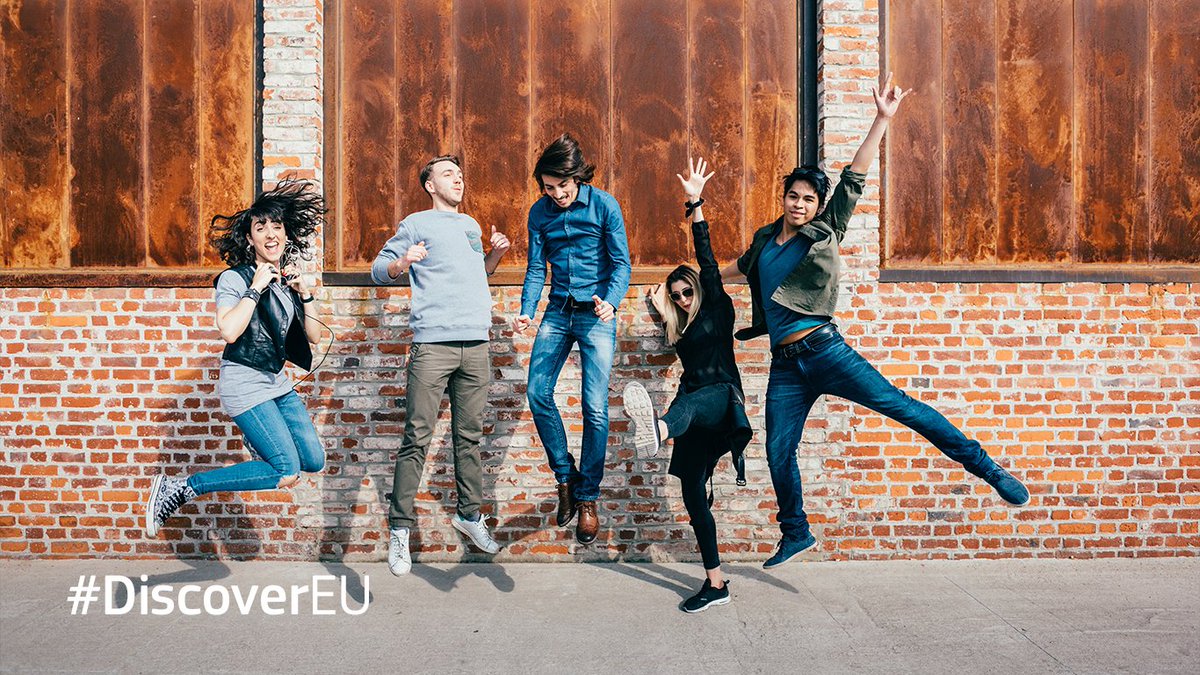 Young people jumping in the air outside