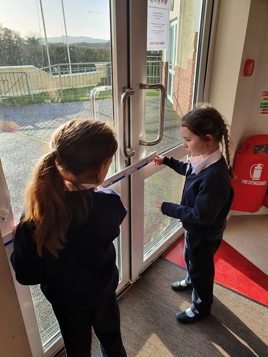 kilbehennyns's tweet photo. First class were very busy today learning how to use a meter stick to measure the length and width of our school front door and yard! #middleroom #mathstime #KBNS @Maths_Eyes https://t.co/qjITqMBF71