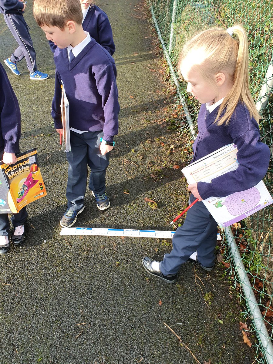 kilbehennyns's tweet photo. First class were very busy today learning how to use a meter stick to measure the length and width of our school front door and yard! #middleroom #mathstime #KBNS @Maths_Eyes https://t.co/qjITqMBF71