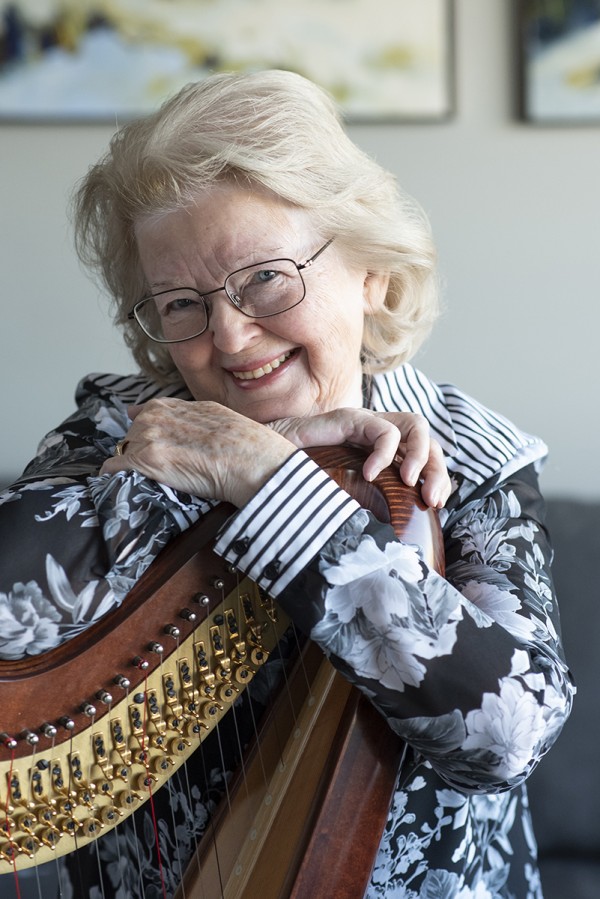 Peg Calder is photographed with her harp