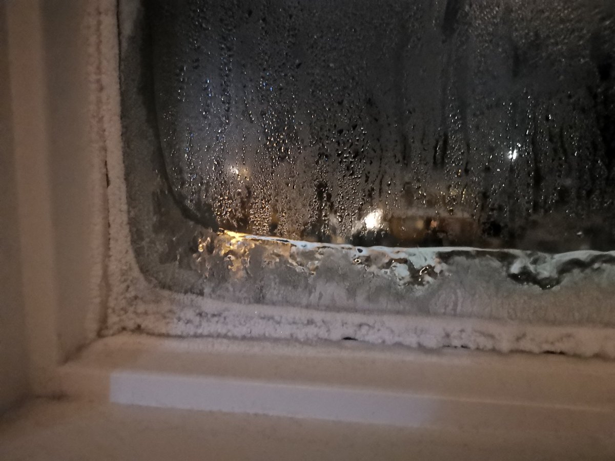 liamsrobson's tweet photo. It's so cold that there's ice on the inside of our hotel room window #cold #Alberta  #Canada https://t.co/xuL8RddBI8