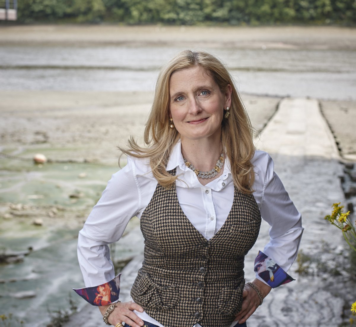 A picture of Cressida Cowell in a white shirt and waistcoat