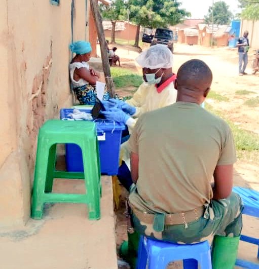 barryrodB's tweet photo. #Biakato Mine, #Mandima Health zone. A Soldier convinced by @BarakaHumudi and @WHO #RCCE colleagues is now seated at the ring to be vaccinated. Important to notice that 6 other Soldiers accepted to get the vaccine & become protected against #Ebola the deadly disease. https://t.co/2tyGmBF5UK