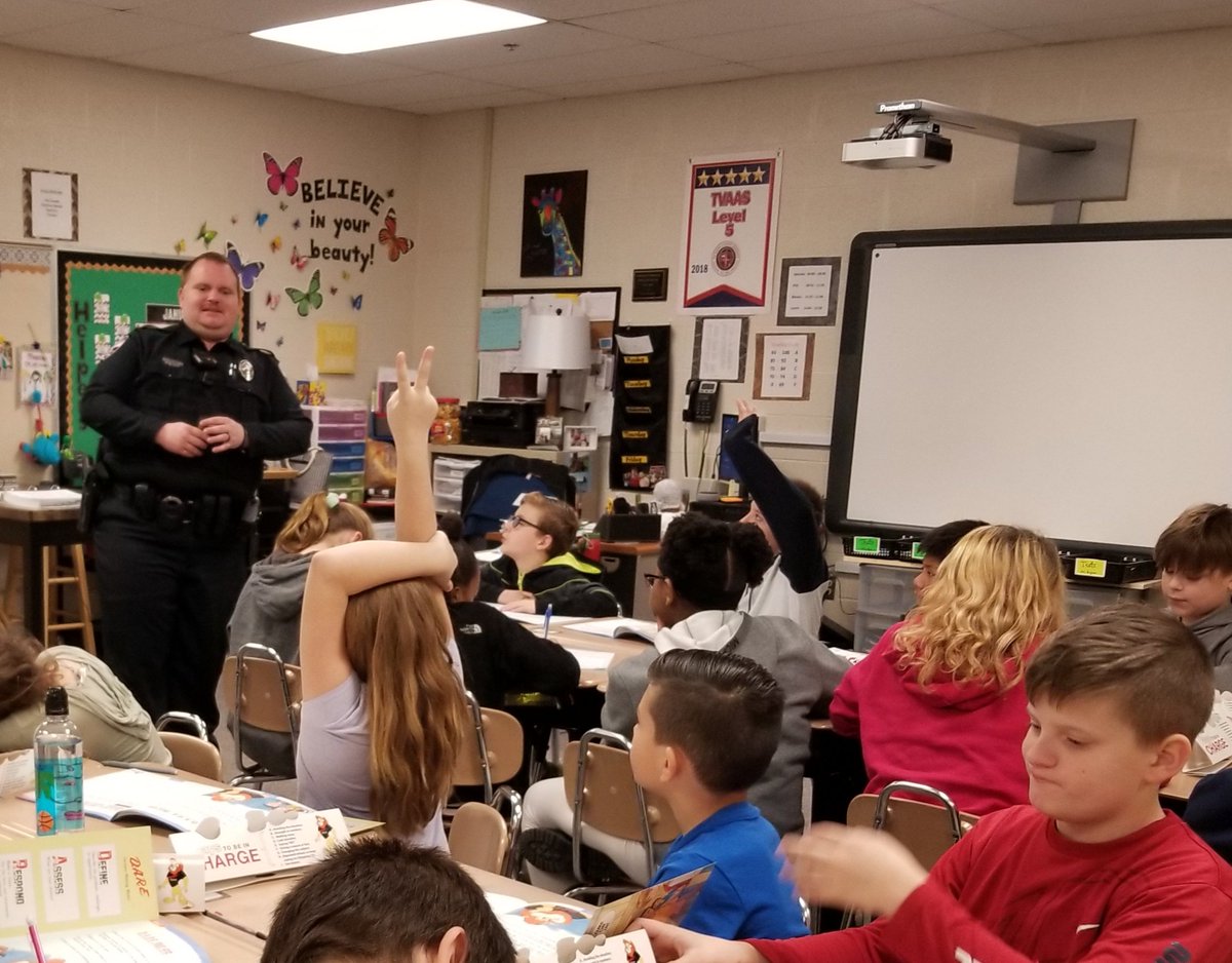 Officer Lewis teaching his first DARE class.  Thank you for caring about our students!  #teachCENT