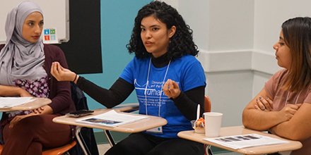 LaGuardia Mellon humanities scholars presenting at a conference session.