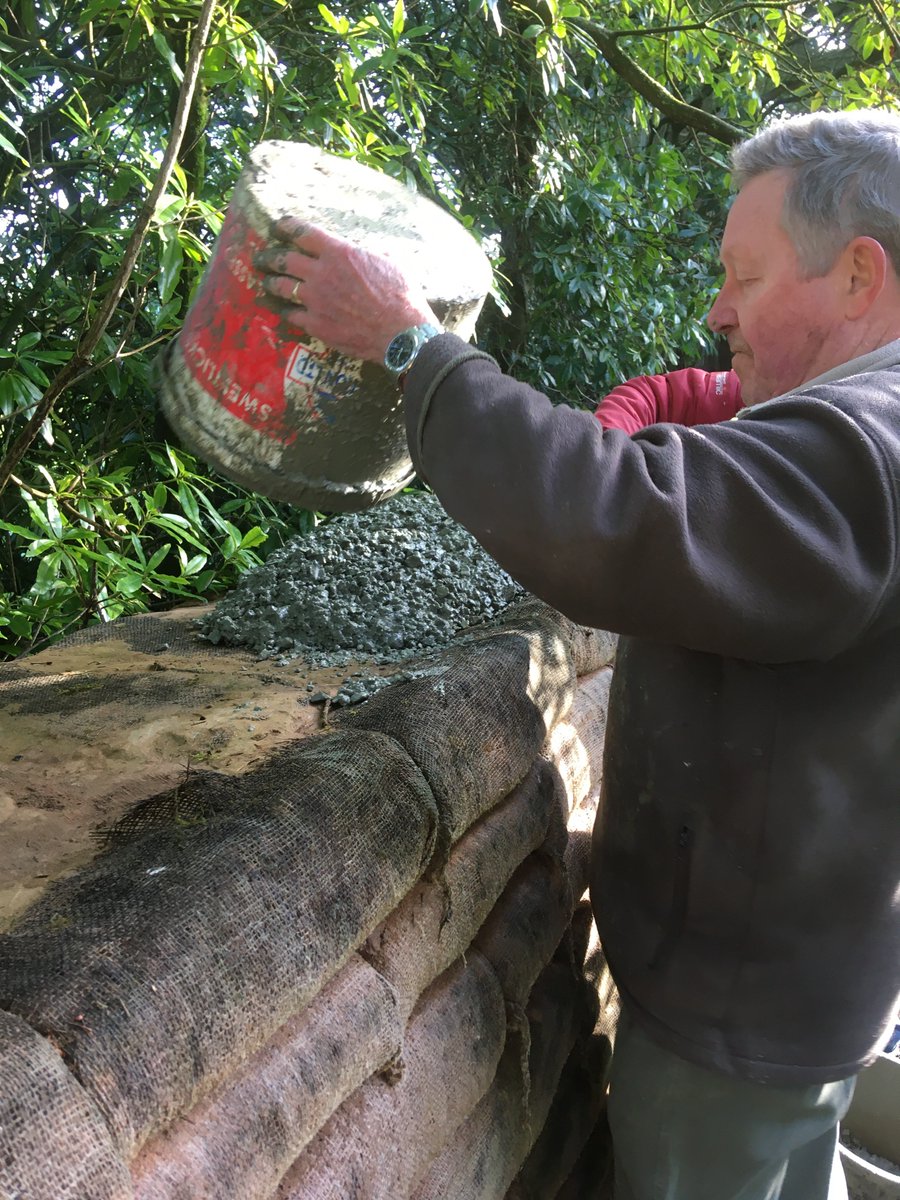 JudyCorbett's tweet photo. Great to be back on the wall with Team Gwydir. So much achieved. Busy day putting concrete capping on the wall to protect it. What incredible people you are - so game & good-humoured - no one complained about getting covered in cement, only laughter!
#protectinghistory https://t.co/BWqhi2YUXA