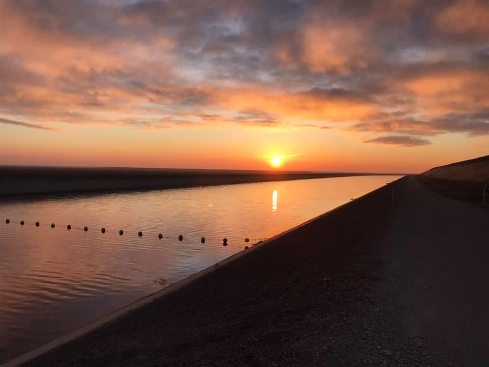 USGSwaterCA's tweet photo. It's a beautiful morning in the #CentralValley along the #CaliforniaAqueduct! We're out early checking on the #extensometers we use in monitoring #landsubsidence. #cawater https://t.co/eP9bzKRXjq