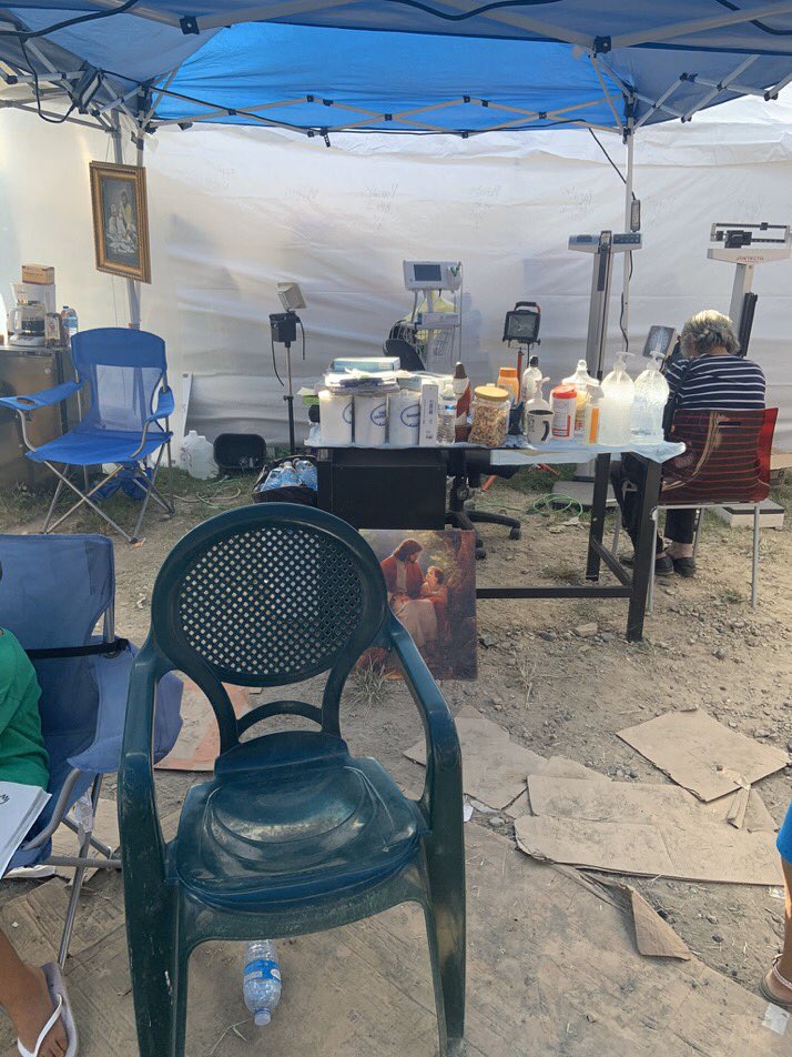 DavidBegnaud's tweet photo. Get this: Dr. Enid Santos of Guayanilla, Puerto Rico is treating patients, in a tent (she's living in), in front of her home. Her house/office, is uninhabitable due to earthquakes. 
She won't accept payment, I'm told, suggesting donors buy supplies to help her treat others. https://t.co/n0GqYl2E4q