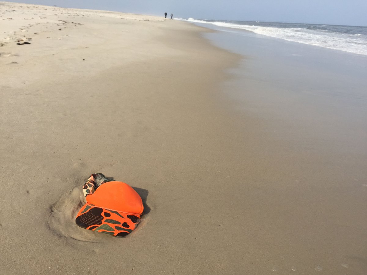 A hat on a beach.