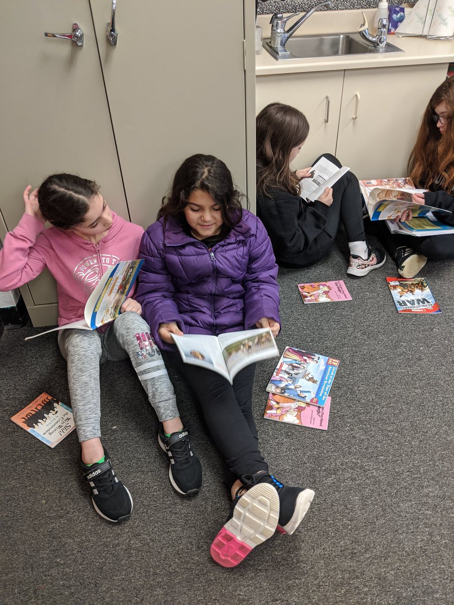 Bscearceteach's tweet photo. Reading partners browsing nonfiction books for our Reading History Unit! #WEareLakota @wolvestweet @4thgradewolves https://t.co/Yn27s8g79F
