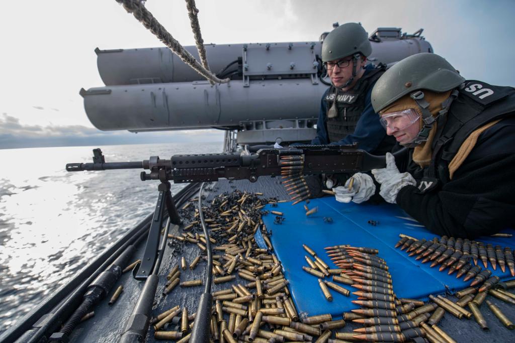 #USNavy photos of the day: A Sailor stands watch aboard #USSCarney, #USSAmerica conducts flight operations, An #mh60 Sea Hawk helicopter takes off from #USSMontgomery and Sailors fire an #m240 machine gun aboard #USSCarney. ⬇️ info & download ⬇️: navy.mil/viewPhoto.asp